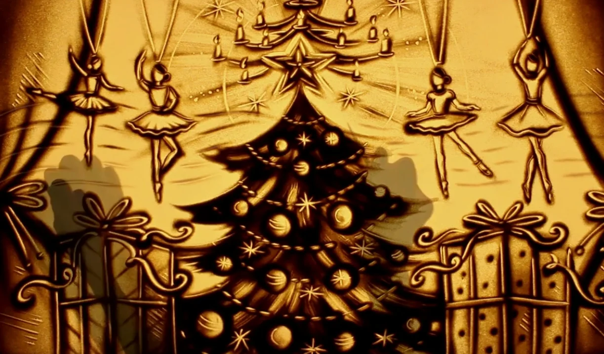 Sand animation Christmas tree and ballet dancers