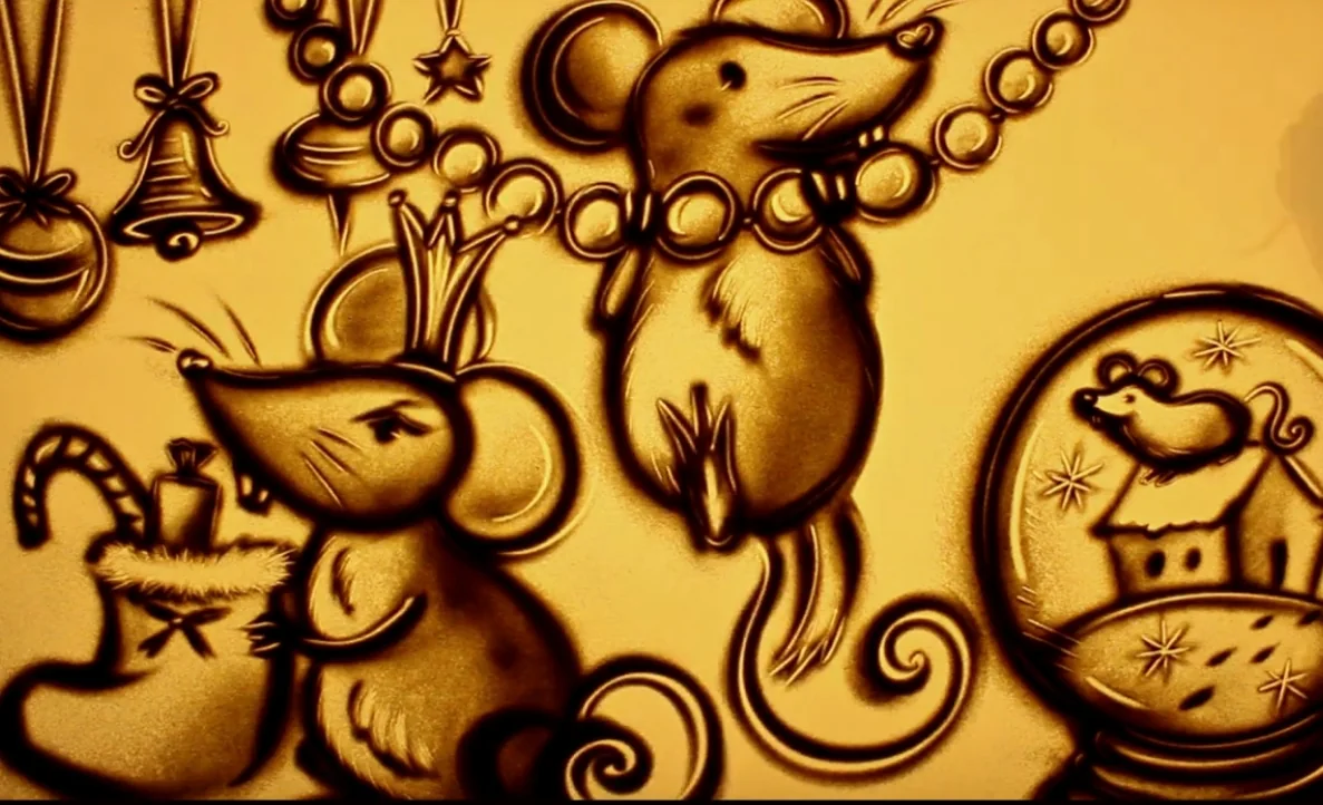 Sand animation mice and holiday ornaments